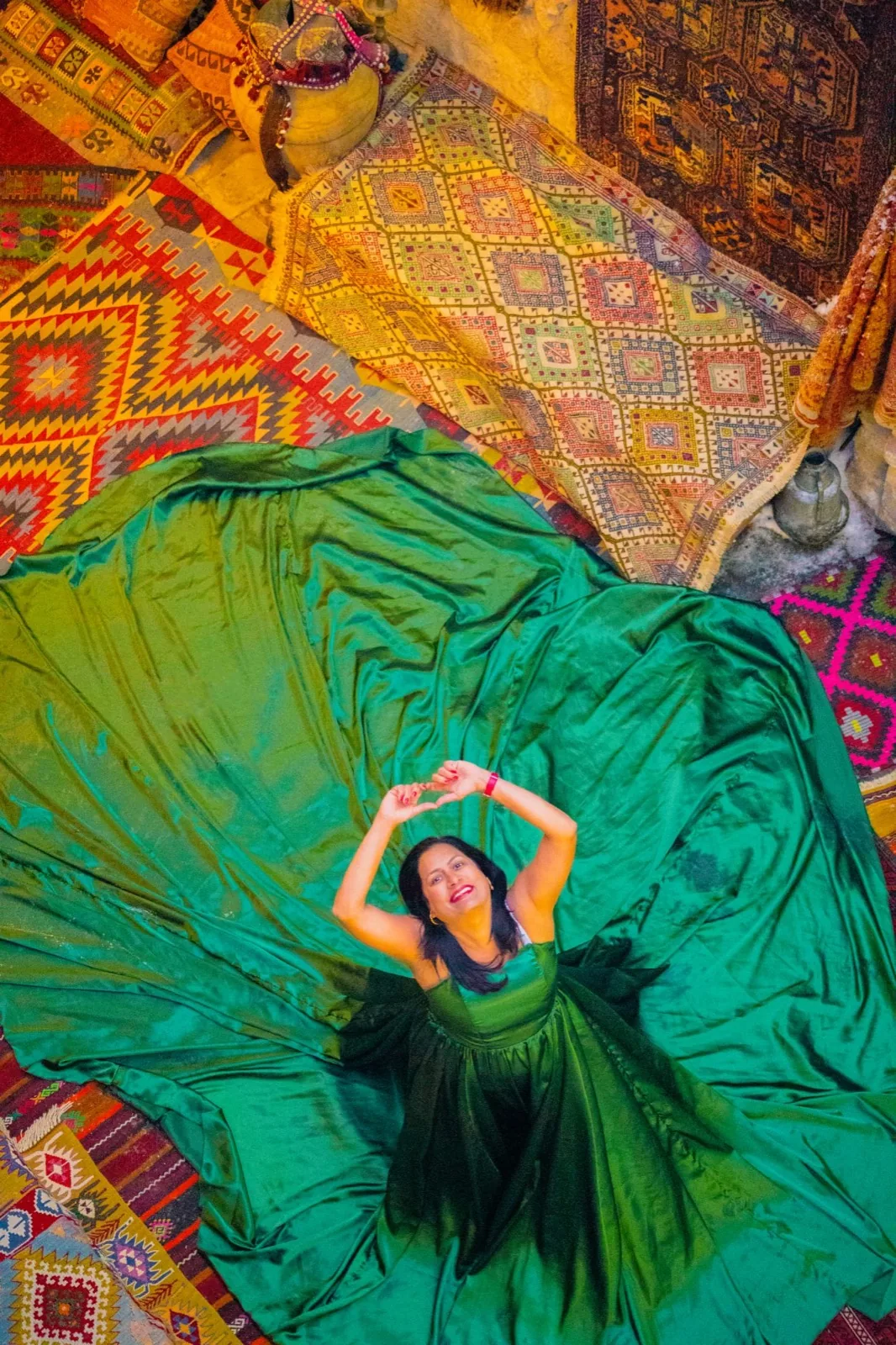 Cappadocia flying-dress photoshoot in a carpet shop