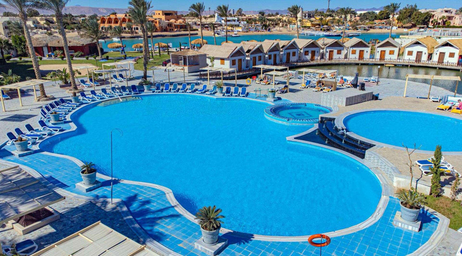 Main pool of Panorama Bungalows Resort with the lagoon behind