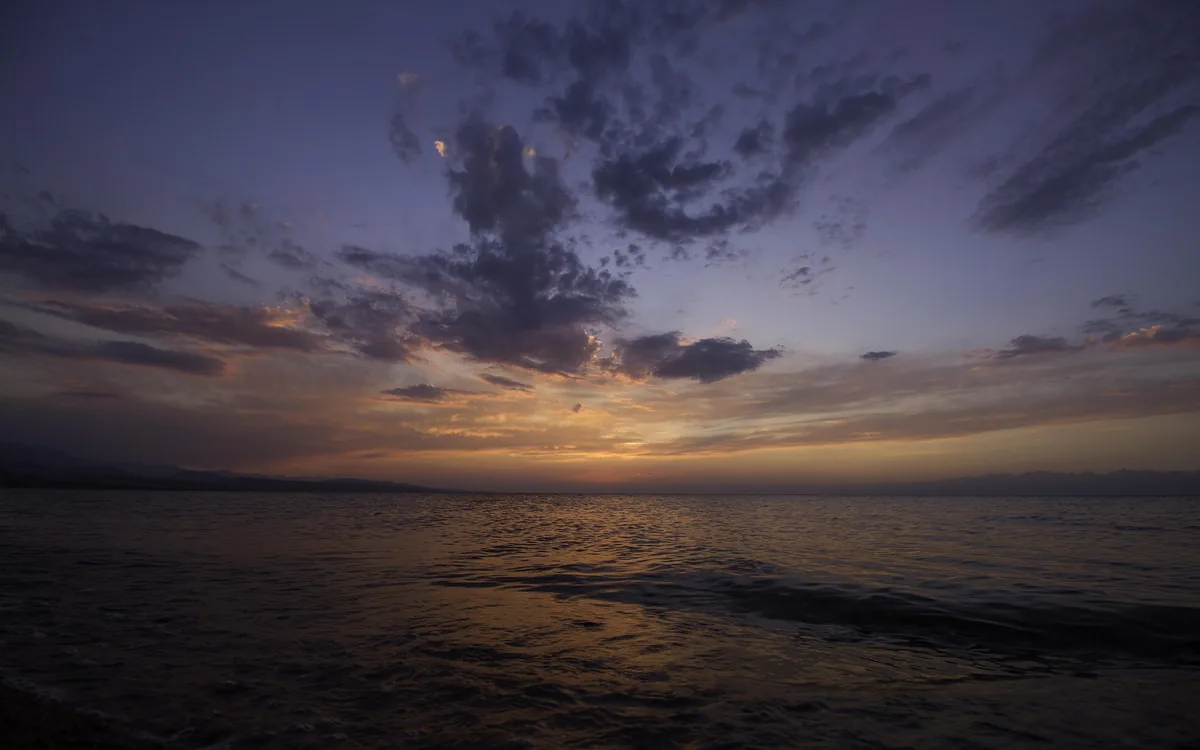 Sunset over the southern shore of Issyk-Kul lake