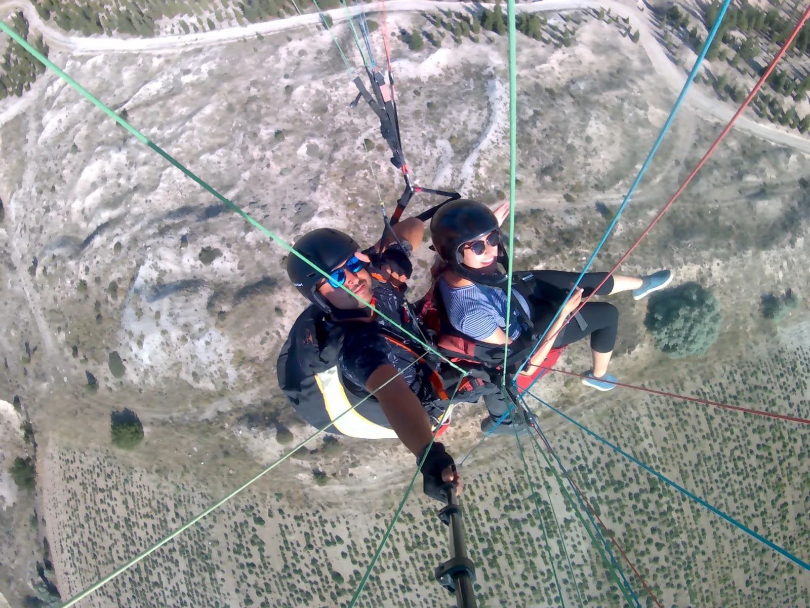 Tandem paragliding above Cappadocia